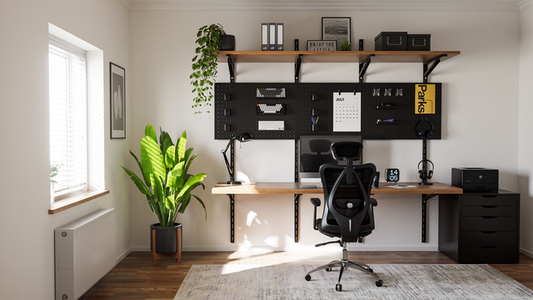 Modern home office with desk, chair, and shelves.