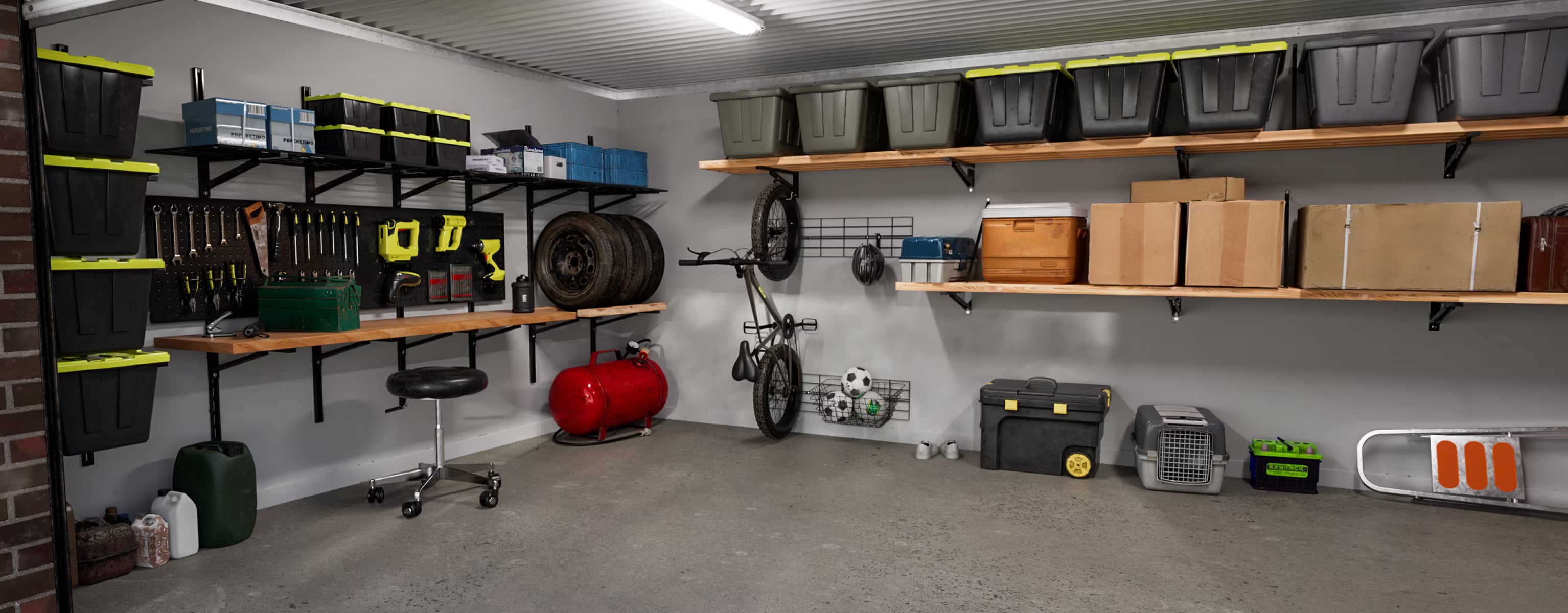 Organized garage with shelves, tools, and equipment.