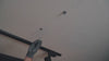 Video showing the third step of the Ezyrack Tote Master Pro installation, demonstrating the insertion of wall plugs into pre-marked holes in the ceiling.